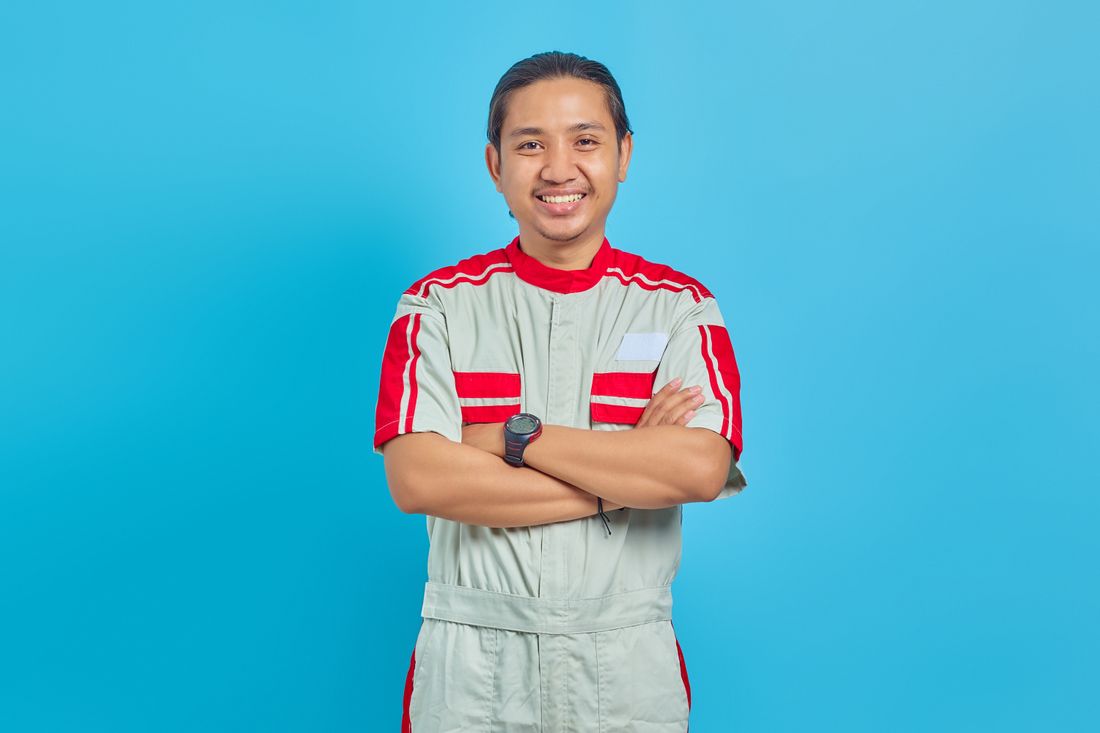 Licensed technician servicing a water heater